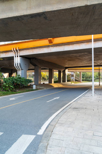 istock Concrete structure and asphalt road space under the overpass in the city 2178161186