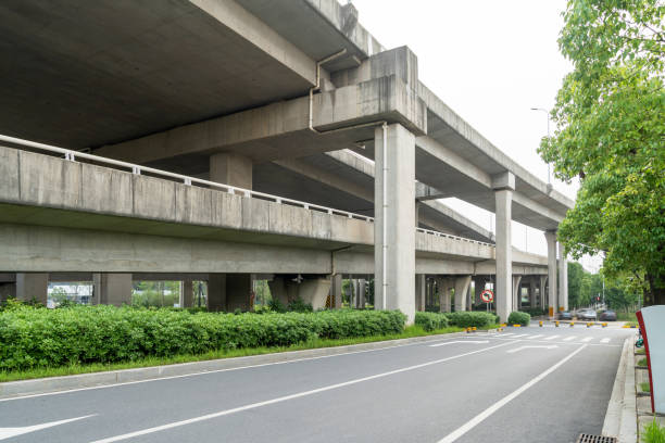 istock Concrete structure and asphalt road space under the overpass in the city 2178161267
