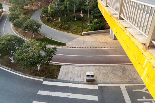 Concrete structure and asphalt road space under the overpass in the city