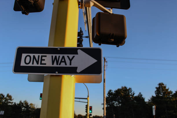 istock one way arrow sign on traffic light post metaphor direction 2178162441