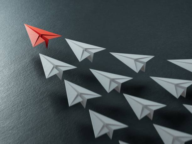 istock Different business concept.new ideas. paper art style. creative idea.Leaderplane concept, red paper plane leading among white.3D rendering on black background. 2178163441
