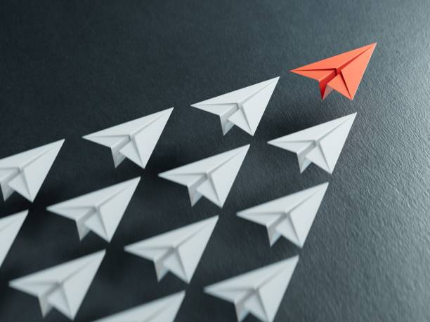 istock Successful Leaderplane Concept Red leader paper planes and followed by white white planes. Strategic planning development.3D rendering on black background. 2178163548