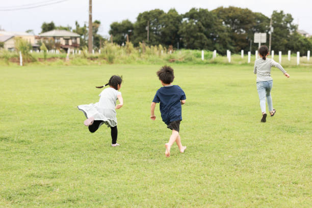 istock Children Runing and Playing At Park 2178166705