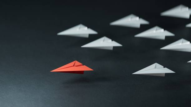 istock Different business concept.new ideas. paper art style. creative idea.Leaderplane concept with red paper plane leading among white.3D rendering on black background. 2178166942