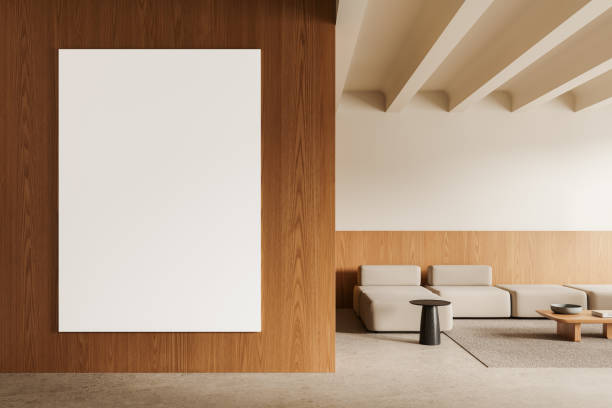 istock Blank vertical poster mockup on wooden wall in modern interior. 3D Rendering 2178168989