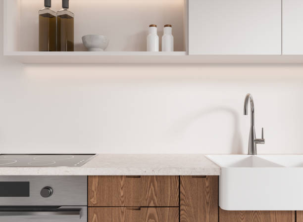 istock Modern kitchen interior with wooden cabinets and sleek appliances. 3D Rendering 2178169024