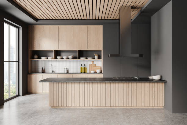 istock A modern kitchen interior featuring wooden cabinets and a matching island, with a large window and minimalist decor. Concept of luxury and household design. 3D Rendering 2178169696
