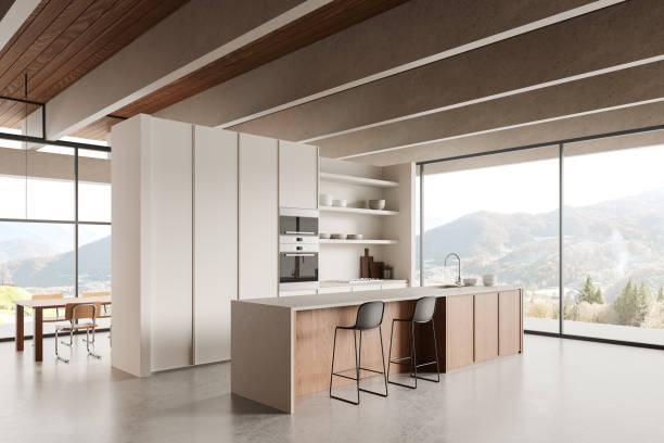 istock House kitchen interior with cooking cabinet and eating zone, panoramic window 2178169706