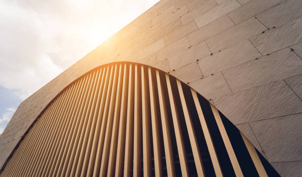 A structure featuring wooden slats on construction site contributing to its architectural style.