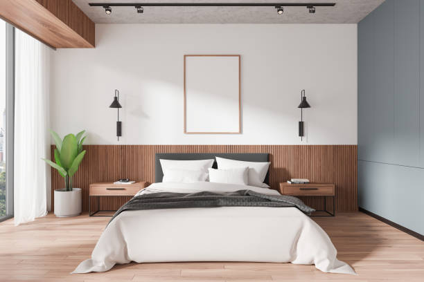 istock Modern bedroom interior with blank framed poster on wall above bed. 3D Rendering 2178169768