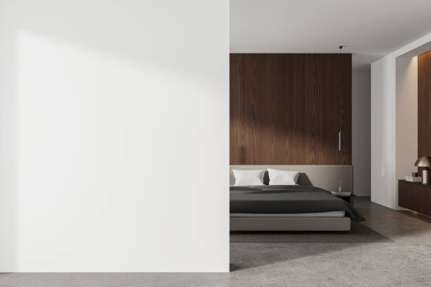 istock Stylish hotel bedroom interior with bed, drawer with decor and mock up wall 2178169787