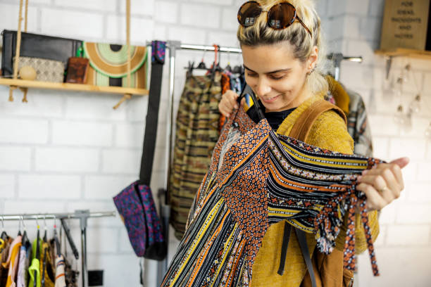 istock She is happy when she finds good clothes 2178175310