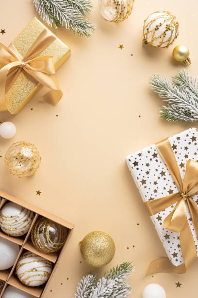 istock Luxurious Christmas vertical scene featuring gold wrapped presents and elegant ornaments. Perfect for festive celebrations and holiday spirit inspiration 2178175988