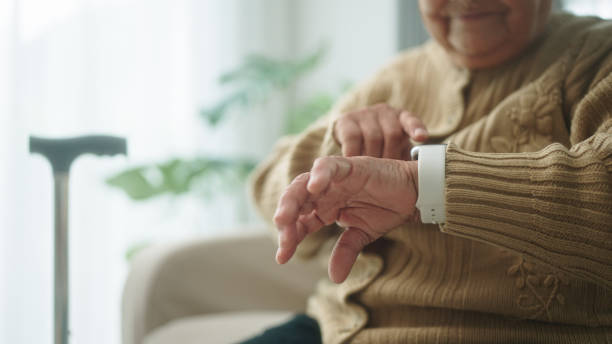 istock Elderly using smartwatch medical alert devices. 2178176958