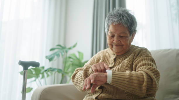 istock Elderly using smartwatch medical alert devices. 2178176959