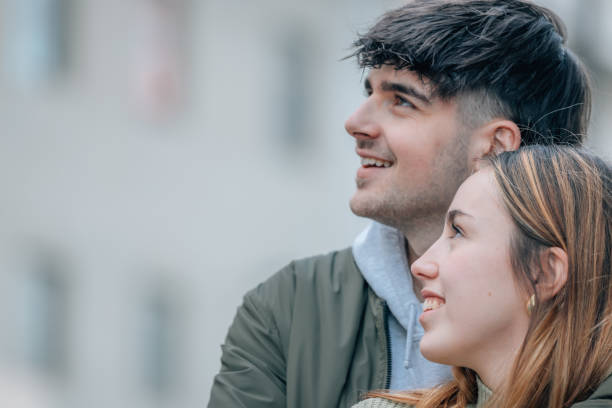 istock wedding couple hugging on the street 2178181636