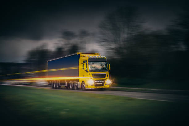 istock Yellow Lorry transport in motion 2178184694