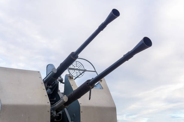 istock Double-barreled naval automatic cannon against the sky close-up 2178188296