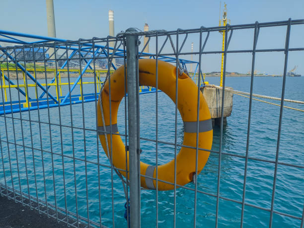 istock Buoys on the fence of the loading and unloading port 2178196225