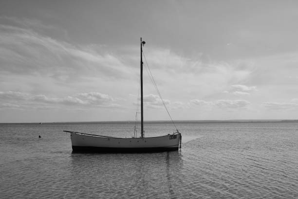 istock Solitary Sailboat on Calm Waters 2178201469