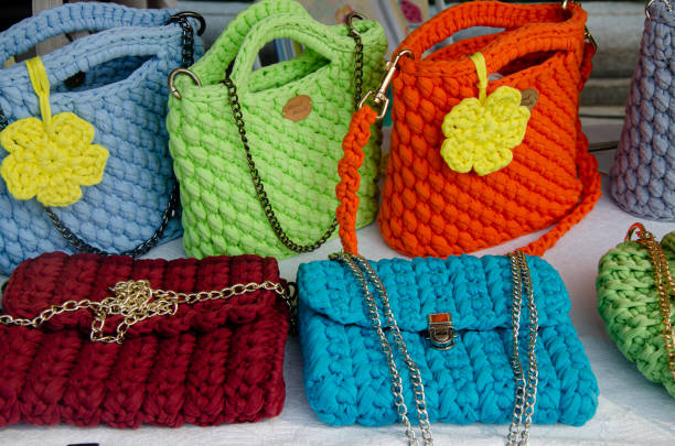 handmade knitted shoulder bag made of jute. boho eco shopper, reusable sustainable shopping. DIY bag, zero waste lifestyle. vertical