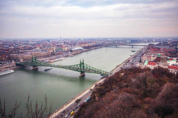 High angle view  of Széchenyi Chain Bridge  and Pest side of Budapest along the Danube river including St. Stephen's Basilica and Vigadó Concert Hall in Autumn.