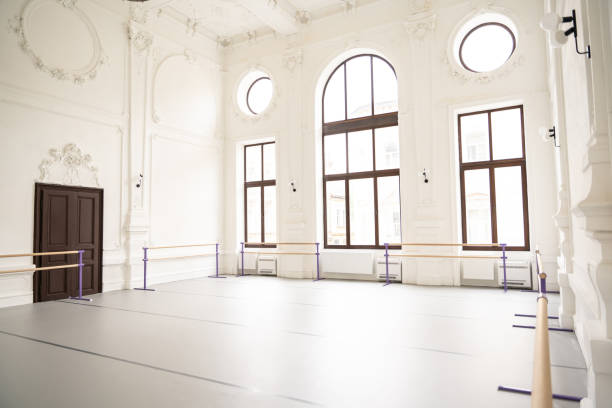 istock Empty room with barre on wall providing perfect space for stretching and ballet workout 2178206097