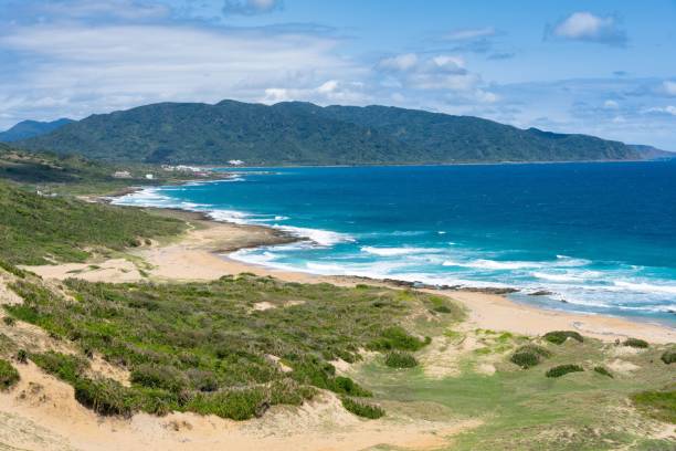 istock Longpan Park coastline in Kenting, Taiwan under a partly cloudy sky. 2178209828