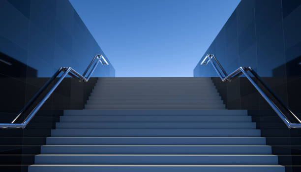 istock Empty black stairs in pedestrian subway. 3D Render. Marble or concrete staircase to the top with shiny chrome handrails leading to clear sky. View of the granite wall in the underpass, the handrail 2178217215