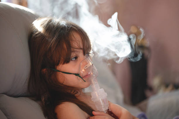 istock Girl portrait of using nebuliser 2178218132