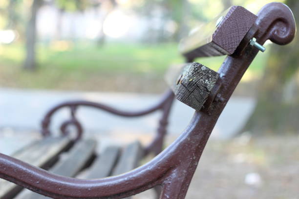 istock Bench.
A close-up view of a vintage park bench. 2178218585