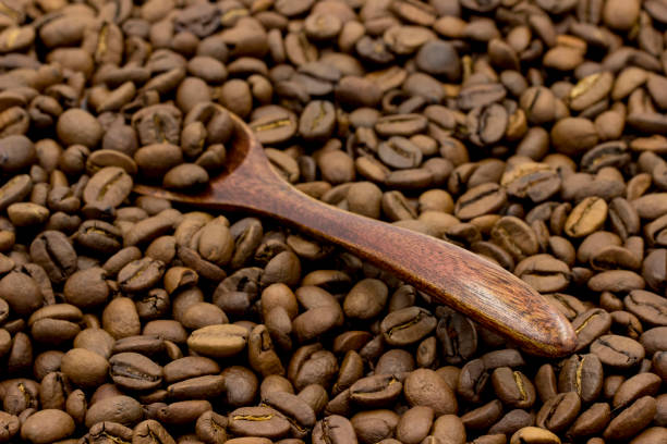 coffee beans and a wooden spoon
