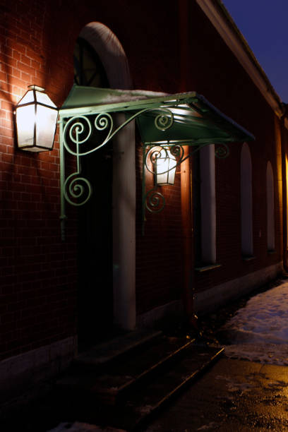 istock an old door with hanging lanterns 2178232423