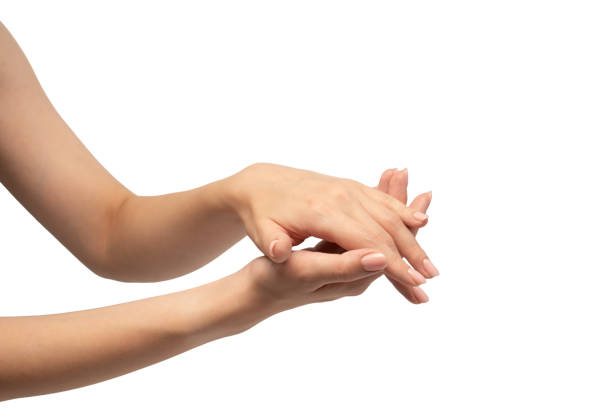 istock Woman hands with nude manicure isolated on a white background. 2178239181