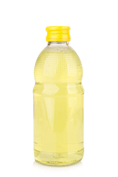istock Glass bottle, yellow water isolated on white background 2178240280