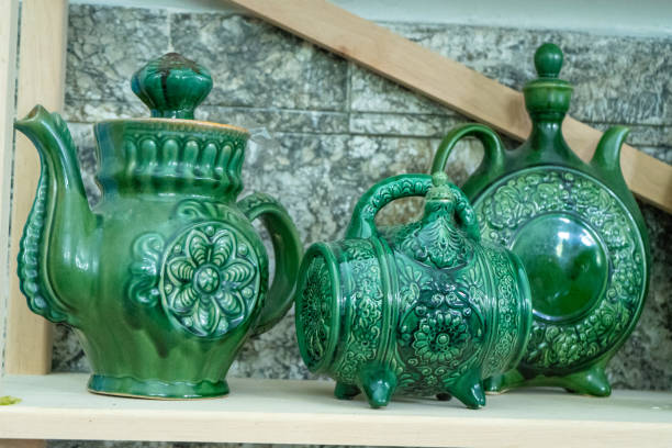 istock Various decanters for wine and drinks. Ukrainian clay ceramics. Green tableware. Jug 2178244107