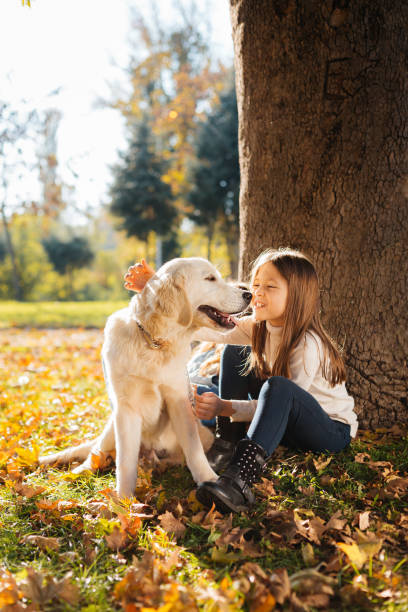 istock Girl and her dog endles love 2178244420