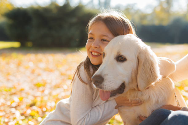 istock Girl and her dog endles love 2178244457