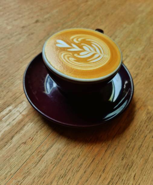 istock Hot cappuccino in a purple cup 2178247026