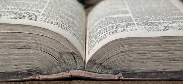 istock Close-Up of an Open Antique Book 2178251726