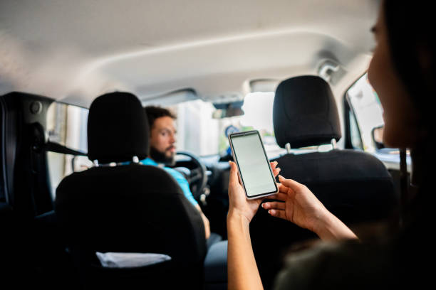 istock Close-up of a mobile screen at taxi 2178252221