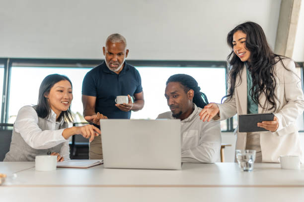 istock Diverse Team of Professionals Discussing Strategy in Office Setting 2178255589