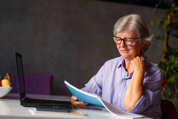 istock business woman reads a book 2178256187