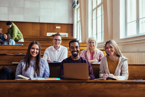 Diverse Group of Students Smiling in University Lecture Hall