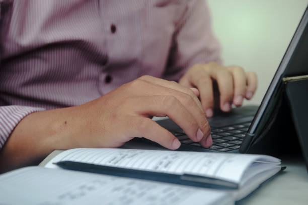istock Close up of bussines man hands typing 2178258123