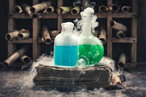 istock Alchemist laboratory with chemical flask as mystical background 2178261916