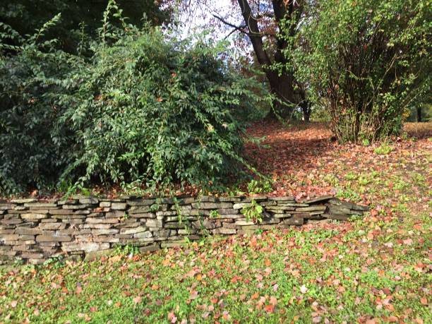 istock Dry-laid stone garden wall 2 2178263510