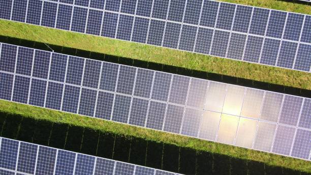 istock Sun reflecting off solar panels, solar farm producing sustainable energy 2178265585