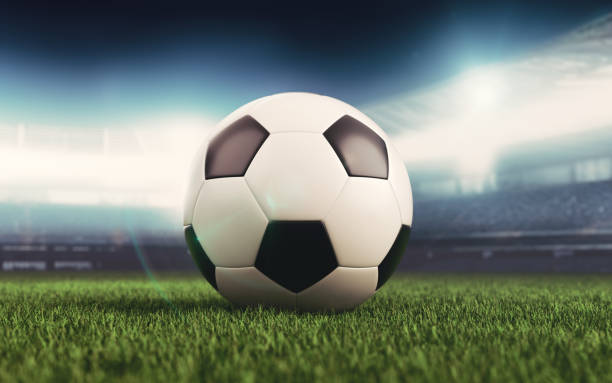 istock Soccer ball in Black and White colors on stadium background 2178273302