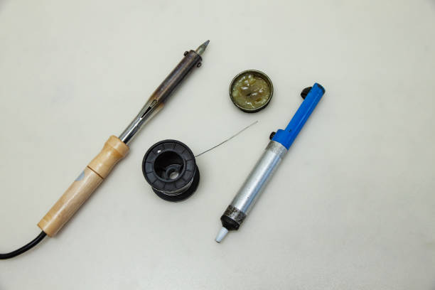 istock Soldering iron with soldering accessories on a white background 2178273770